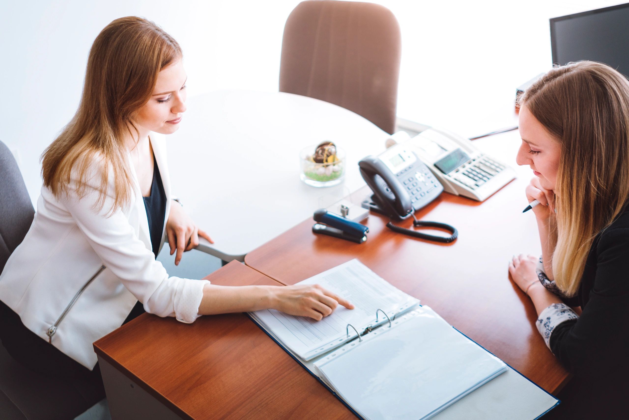 insurance advisor consulting client professional neutral office